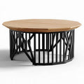 Octagonal wooden coffee table with metal base suitable for modern living spaces